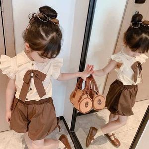 의류 세트 아기 여자 여름 세트 2024 New Bow Tops+Shilds Childrens 2 조각 세트 아이 의류