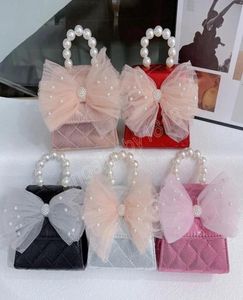 Koreanische kleine Mädchen Geldbörsen und Handtaschen süße Kinder Prinzessin Bow Crossbodybag Baby Party Bow Handtaschen Geschenk2469263