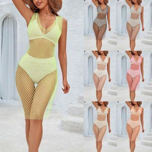 Bikinis Cover-ups häkeln Tunika Sexy Spaghetti-Gurt hohl Out Bodycon Maxi Kleid Frauen Sommerkleidung Quasten Strandbekleidung