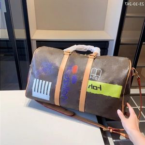 Echtes Leder im Freien Reisetasche Herren Herren Herren Duffel Taschen Buchstaben Luxusbeutel Erde gedruckte Buchstaben Handtaschen Marke Paare MQOEN