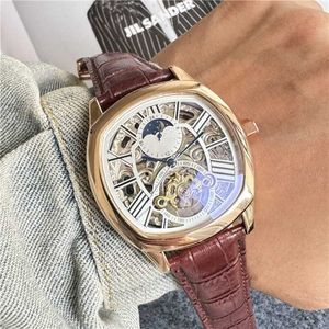 Titta på Watches AAA Titta på Mechanical Watch Mens Watch Swiss New Tourbillon hela automatiska ihåliga Mechanical Watch Business Belt Watch