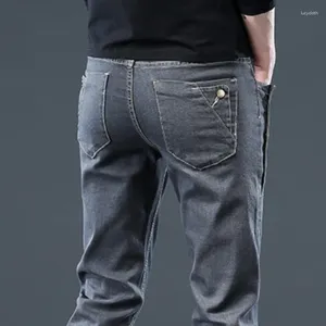Dżinsy męskie koreańskie dżins dla męskich wysokiej jakości rozciągnięcia szczupłe spodnie mody projekt przycisku fajne marka mężczyzny