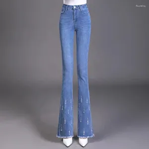 Kvinnors jeans koreanska mode kvinnor flare våren höst streetwear tassel hög midja mager kontor lady casual denim byxor