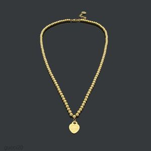 Дизайнерское ожерелье подвески ожерелья Peach Heart Свадебное мяч Цепочка рождественские украшения как золото/серебро/розовая бусинка YBPI