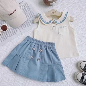 Set di abbigliamento da ragazze set di vestiti estivi camicia da giro senza maniche+pantaloncini di moda corean college in stile cucciolo da bambino a due pezzi set da ragazze abiti