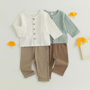 Set di abbigliamento 2024 bambini bambini cadute 2 pc outfit a colori solidi a colori a maniche lunghe a maniche lunghe pantaloni in vita elastico set di cotone