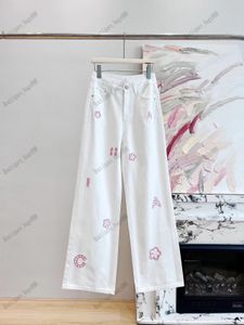 女性のデザイナーパンツレッグスプリットタイトな豪華なデニムのズボンとベルベットの弾性温かいスリムデニムズボンストレートウィメンズ刺繍印刷。