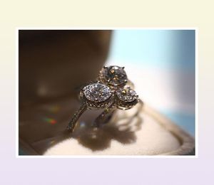 Original leuchtender ehrenwerter Luxusschmuck 925 Sterling Silver Round Cut 5A Kubikzirkonia CZ Diamond Engagement Band Ring für WOI9287564