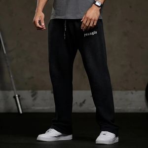 Masowe męskie odzież na siłownia sportowa fitness swobodne spodnie na zewnątrz joggingowe spodnie dresowe bawełniane średnie talii sznurka