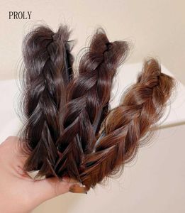 Pannband proly nya mode kvinnor pannband aricial hårband flätat hårband icke-halktänder turban klassiska hårtillbehör T2210071975055