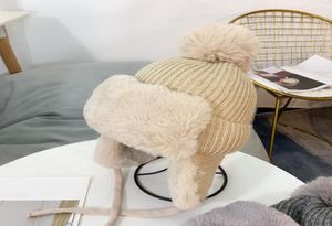 Beanieskull Caps 2022 Winter Russian Bomber Hats for women Men Men Outdoor Warm Snow Hat With Fur Pompom Withproof Woolen Earflap TRA6265777