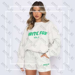 Белая футболка Foxx Женщины подходят для нового дизайнерского спортивного костюма Women Fashion Sporty с двумя кусочками.