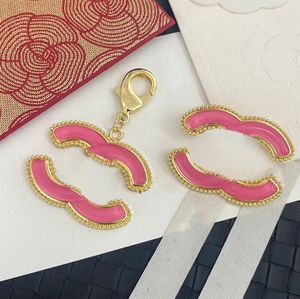 Tasarım Metal Araba Anahtar Çantası Çanta Kolye Takı Takı Çiçek Key Ring Tutucu Kadınlar Moda Moda Mektubu Ana Zincir Aksesuarları