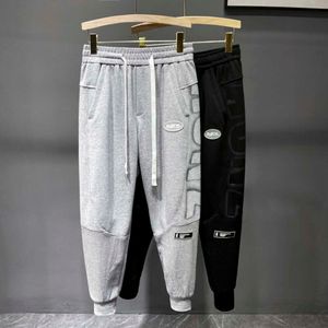 Summer Loose and Versatile jog Sports for Men's Tie Feet Guard Fashion Letter Printing Spliced Casual mens joggers pants drawstring slim