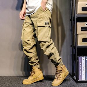 Calça masculina japonesa pesada indústria em estilo múltiplo de bolso de bolso e lazer de outono Marca de moda LOLHA ALL-MATCH