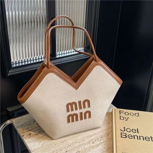 Large-capacity bag female 2024 new French Joker fashion shoulder bag woven straw commuter tote bag