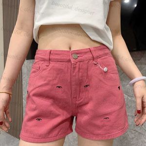 Designer kvinnors jeans vår/sommar hög doftande rosa små svarta broderier personlig rosröd tvätt denimshorts för kvinnor