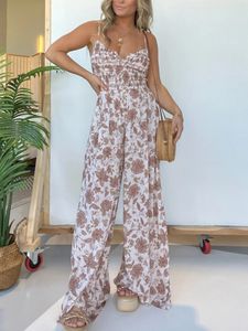 Kvinnliga blommor Suspender Jumpsuit Spring Summer Wide Leg Pants V Neck Spaghetti Strap Loose Fashion Böhmen Rompers kläder 240423