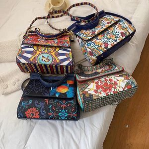 Akşam çantaları moda bayanlar grafiti boyalı çanta çiçek baskısı kadınlar kapak crossbody çanta büyük kapasiteli omuz kare