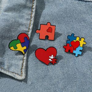 Cytaty autystyczne Pinki Emalia Zakochaj autyzm serca broszka tęczowa puzzle