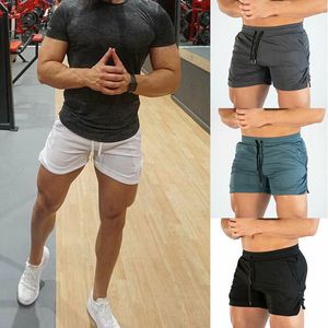 Men Gym Training Shorts Workout Sports Casual Casual Fitness Running Male calça curta Tronco de nadar na praia 240423