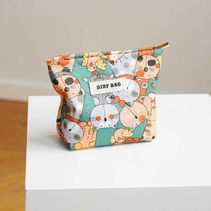 Bolsa de maquiagem do organizador cosmético pequeno desenho verde gato gato pvc impermeável bolsa portátil bolsa cosméticos batom saco de almofada saco de armazenamento de saco de comuter y240503