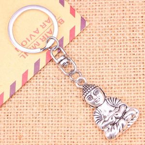 Keychains 20pcs Mode Keychain 39 23 mm Meditieren Sie Buddha -Anhänger DIY MEN JUDER KEUER Ketten Ringhalter Souvenir für Geschenk