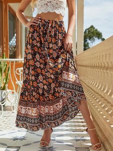 Юбки богемскую макси -юбку Женщины летние цветочные пляжные рюши