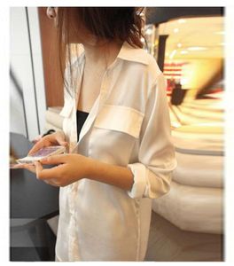 Sexy woman in white shirt and long sections loose longsleeved chiffon shirt double pocket2372424