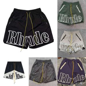 Designer Rhude Shorts Mens Short Beach Mesh Street Casual Chic Sweatpants Basketball Men Limited Swim Kne Length Hip Hop Hop High Sports Training Elastic midja