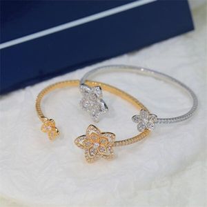 Graf flower bracelet new light luxury niche hollow out complex flower bracelet full diamond V gold super flash is not allergic