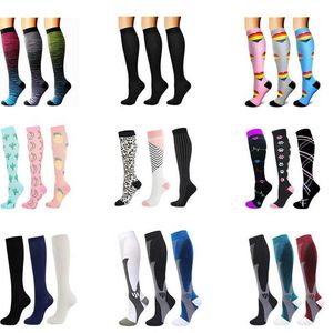 Strumpor Hosiery Dropship Compression Socks Kn High Running Men Women Socks Bäst för Athletic Nursing Outdoor Handing Flight Travel Stockings Y240504