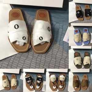 Sandali legnosi per donne donne famose lettere in tessuto in tela muli bassi tacchi a basso contenuto di lusso da donna di lusso scarpe casual flip flop slide claquette più recente