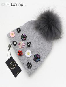 Новый дизайн зимний женский шерстяной шляп с большим настоящим мехом Pom Pom вязаные шапки мягкие цветочные каша