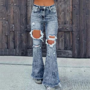 Kvinnors jeans flare Låg midja Lös bekväm för kvinnors byxor 2024 Elastisk mode pojkvän stil hål denim byxbyxor