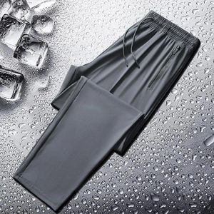 メンズパンツの強化ポケットシームジムトレーニングジョギングエラスティックのための広い脚サイドポケット付きのクイック乾燥アイスシルクスポーツ