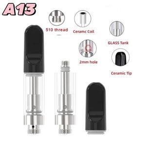 Atacado 0,5 ml 1,0 ml atomizadores TH205 Cartuchos de vape de bobina de cerâmica 510 Frea de vidro de vidro de óleos espessos Cerâmica de vidro carrinhos vazios parafuso preto bocal de espuma em espuma