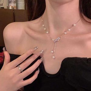 Pendanthalsband 2024 Korean Silver Bow Pearl Pendant Necklace Womens Fashion Crystal Pearl Bead Tassel Kravik Chain Halsband Q240430
