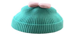 2020 baby autumn and winter wool hat Korean cute bow 13 years old 2 children hat knitted2152384