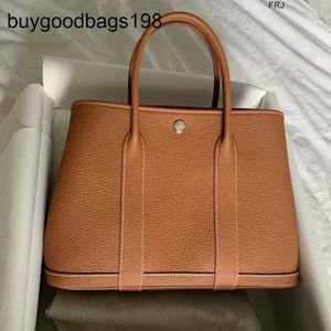 Designer Garden Party Bags 2024 New Cowhide Womens Single Shoulder Oblique Straddle Simple Portable Big Shopping Bucket Have Logo