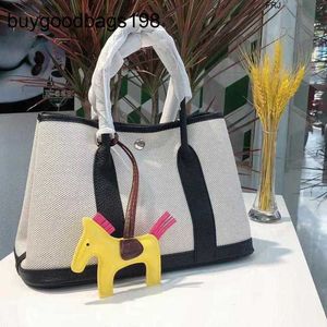 Bolsas de jardim de garden de gardime 2024 New Womens One ombro oblíquo extensão versátil de lona portátil bucket ter logotipo ykc7