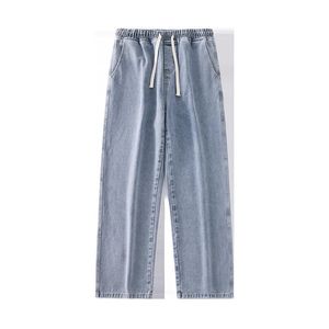 Pantaloni da core di jeans versatili di jeans coreano di jeans a causa della vita elastica maschile.