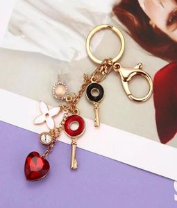 Keychains Classic Fashion Crystal Clover Keychain Charm smycken Rhinestone Car Key Ring Female Bag Pendant Accessories1222089