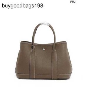 Designer Garden Borse Tote Emmas Same 2024 Nuova moda vera pelle vera pelle secchio per acquisti portatile a spalla singola obliquo ha un logo