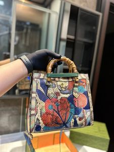 Designer Diana bambu handväska halv elegant halv söt ny retro kvinnors shoppingväska handväska färgglada blommor retro axelväska plånbok
