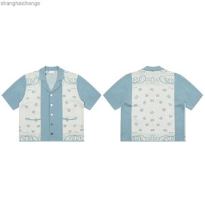 ファッショナブルなルーダーデザイナーシャツ夏の新しいカシューフラワースプライスされた編みジャクアード男性のための短い袖のシャツ
