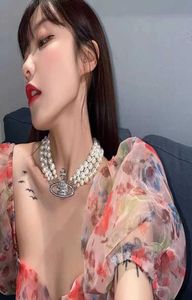 Western empress dowager enne light luxury minority Saturn Pearl Necklace Choker three-layer Necklace female6166048