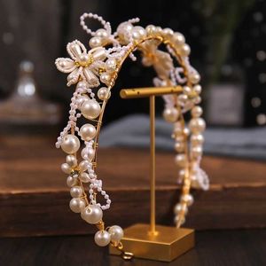 Hochzeitshaarschmuck Kaufprodukte Neue Hochzeitsgeschenkschmuck Set Kopfbedeckung Pearl Blumenform Ohrring Stirnband Zwei-teilige Set Ladies Abschlussball