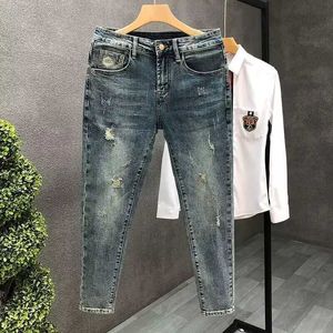 Jeans maschile coreano abbigliamento lussuoso uomo slim fit jeans casual anteriore aperto e autunno retrò aderente jeansl2405