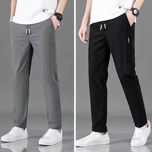 Men's Pants Mens Trousers casual solid breathable ultra-thin straight pants mens jogger thin and quick drying sports pants mens hiking pantsL2405